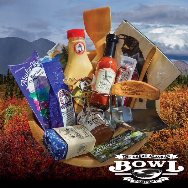 Example Big Dipper Subscript box items in not included wooden bowl with Alaska scenery behind.